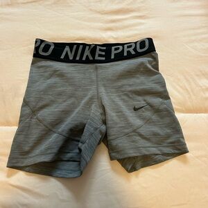 Grey nike pros.